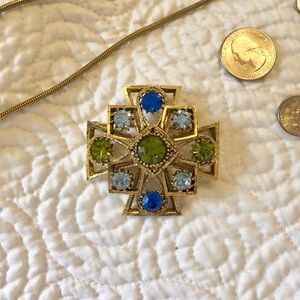 Vintage Lisner brooch with blue and green faux gem